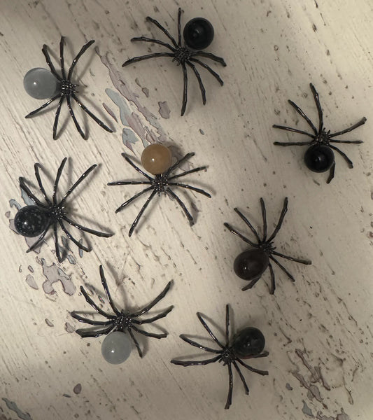 photo of eight crystal body spiders