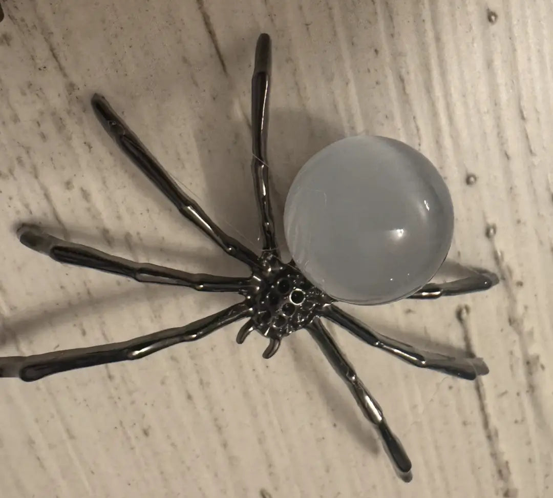 Metal Spider legs with Chatoyant Selenite Body 
