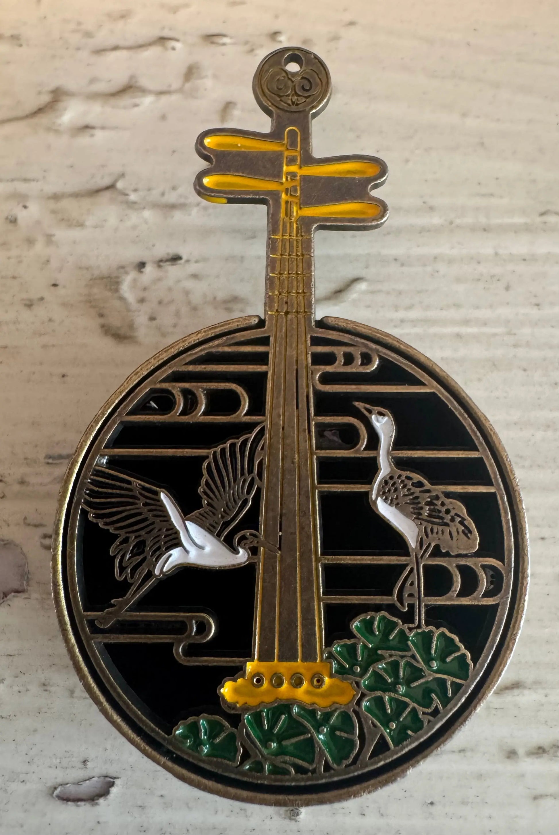 Brass Yueqin incense holder with cranes and lotus leaves