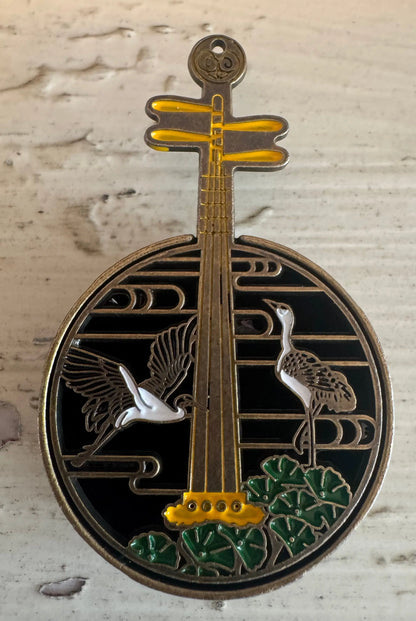 Brass Yueqin incense holder with cranes and lotus leaves