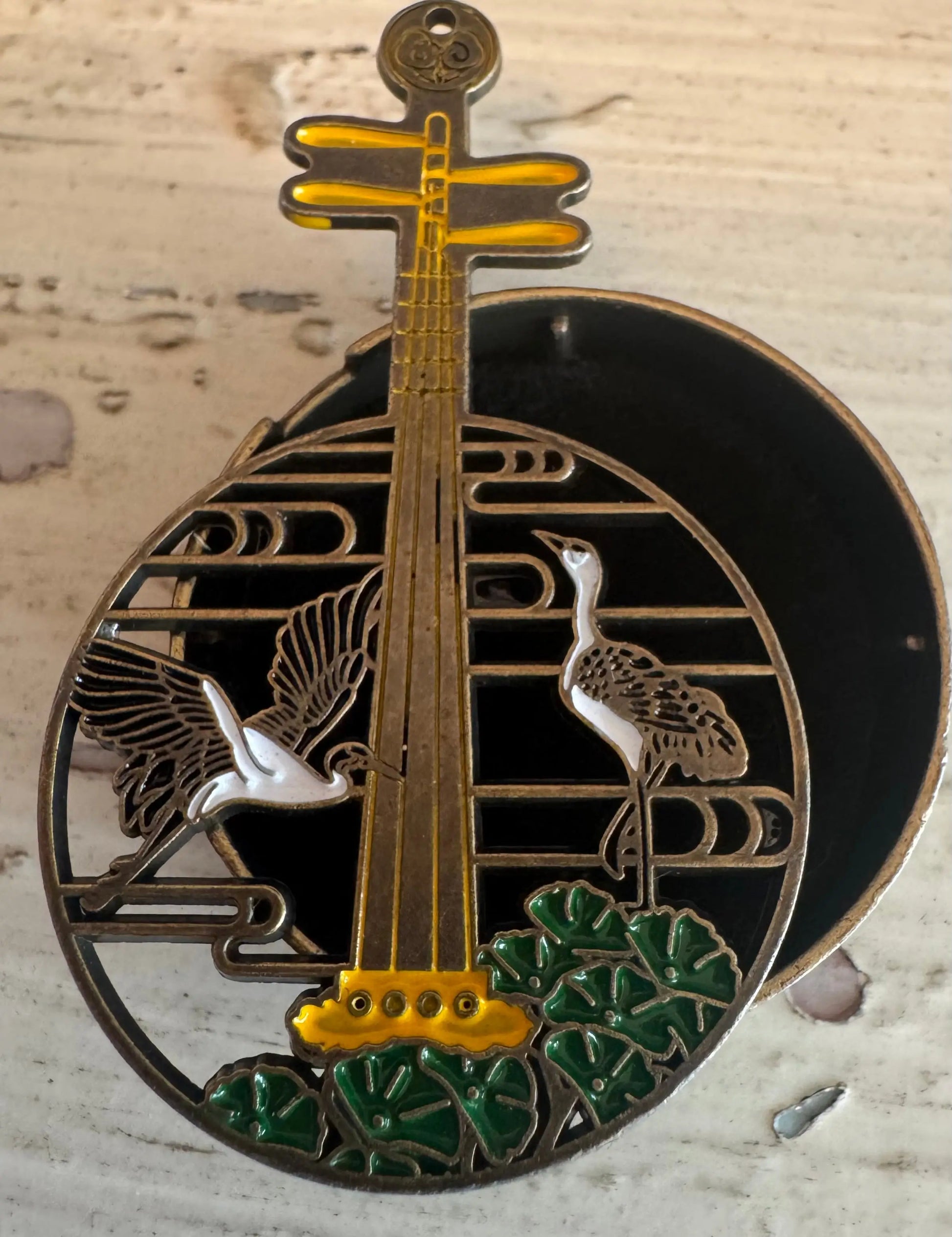 Brass Yueqin incense holder cranes and lotus close-up