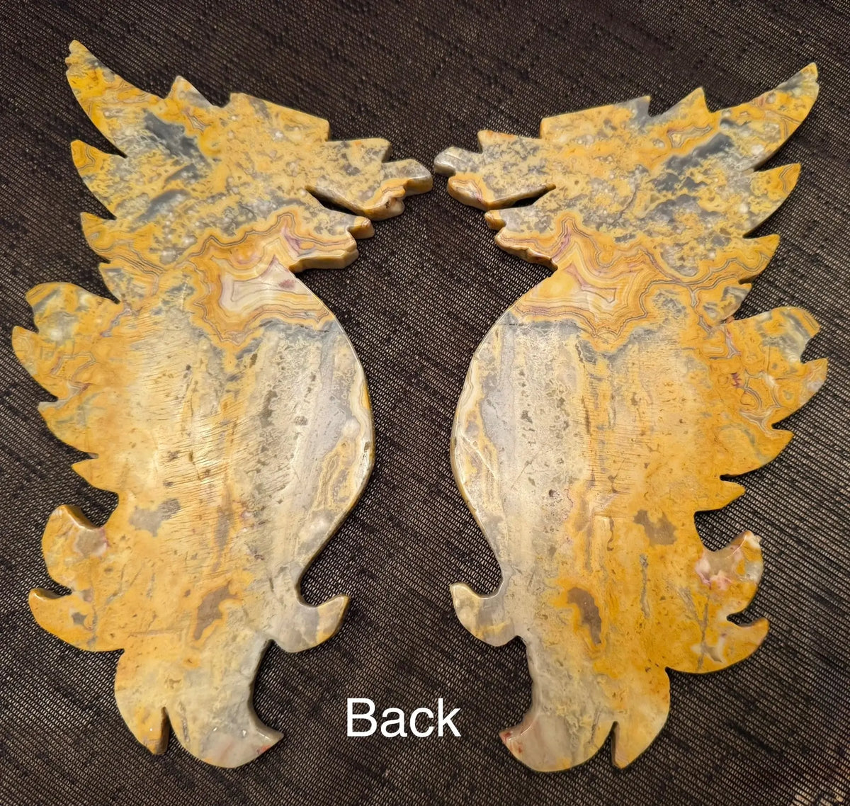 Crazy Lace Agate dragon wing carving close-up