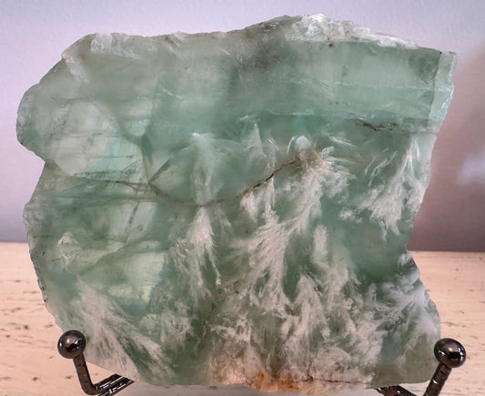 Fluorite mineral slab with Goethite dendrites front view