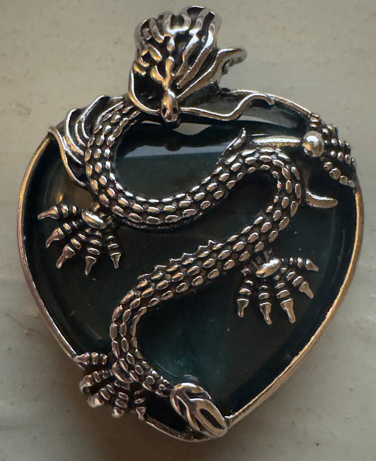Dragon Heart crystal pendant options on display