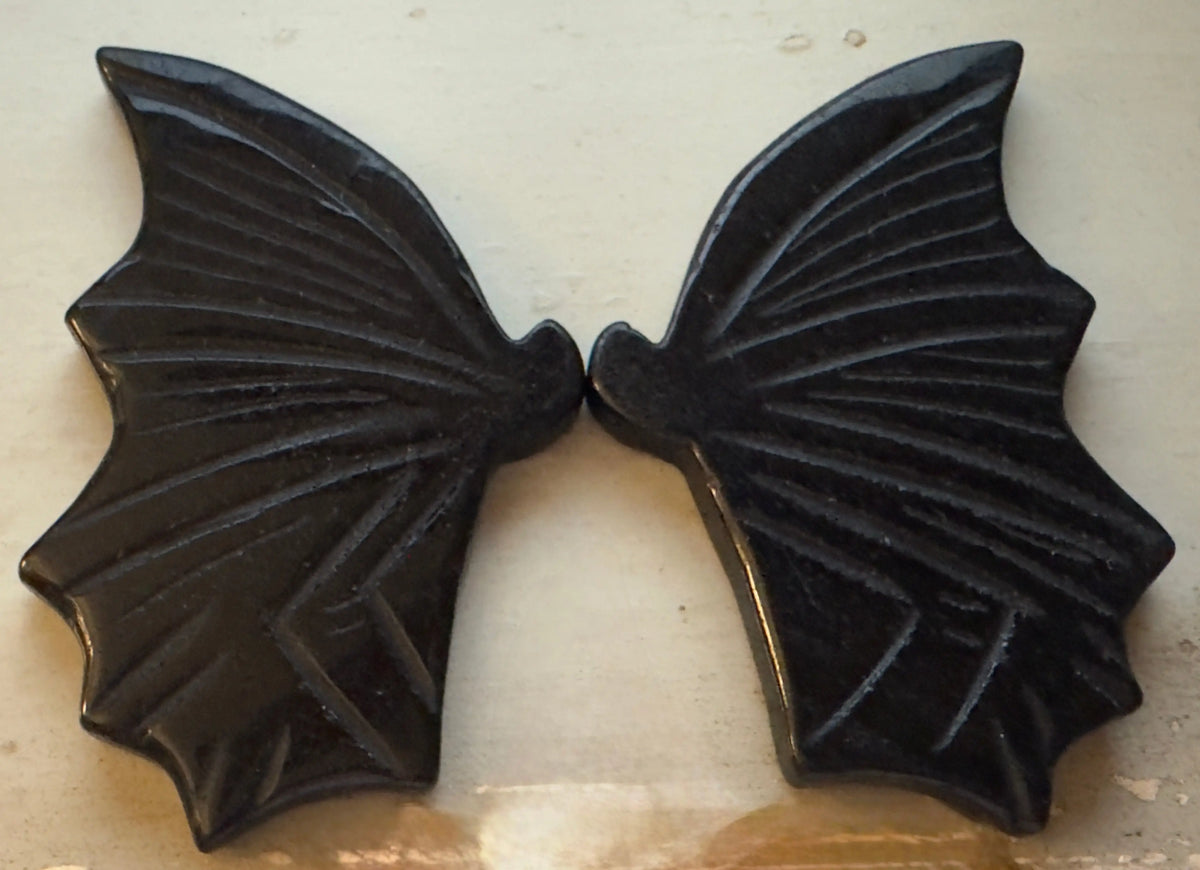 Black Obsidian bat wings carving close-up