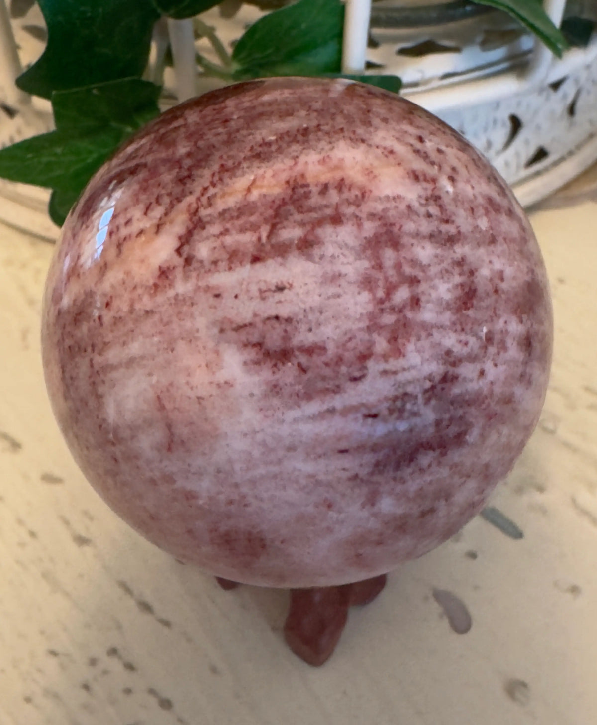 Rhodochrosite crystal sphere close-up