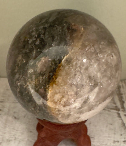 Ghost Quartz sphere with phantom inclusions side view