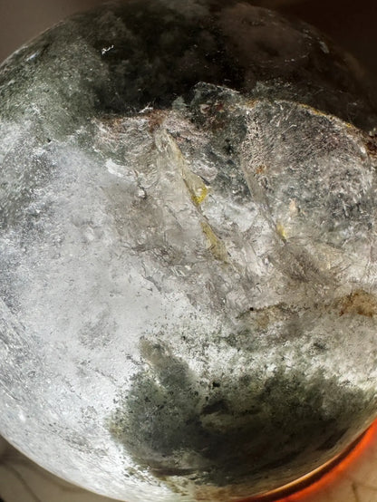 Ghost Quartz sphere with natural inclusions full view