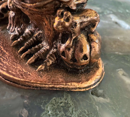 Garden Quartz sphere displayed with bronze owl crown stand