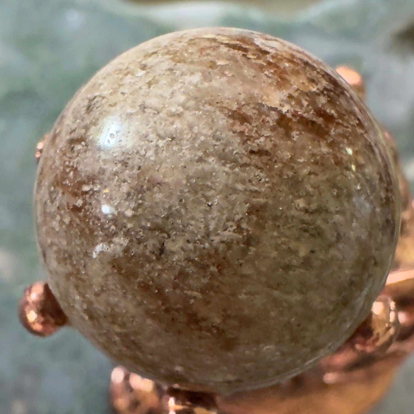 Garden Quartz sphere on bronze Owl Crown stand