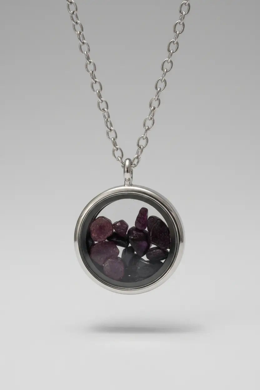 Silver and glass round locket filled with crystals  locket on a silver chain