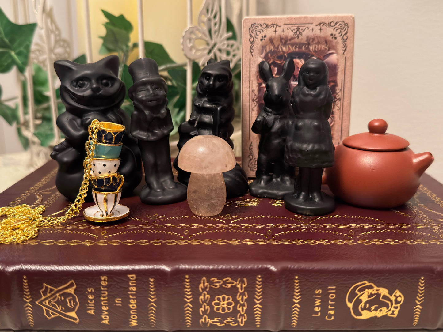 Alice in Wonderland crystal figurine set with obsidian and quartz pieces