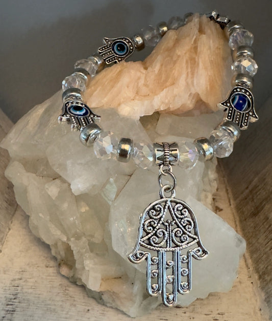 Clear quartz, silver and hamsa hand (some with evil eye spinners), charms Silver filagree hamsa hand.