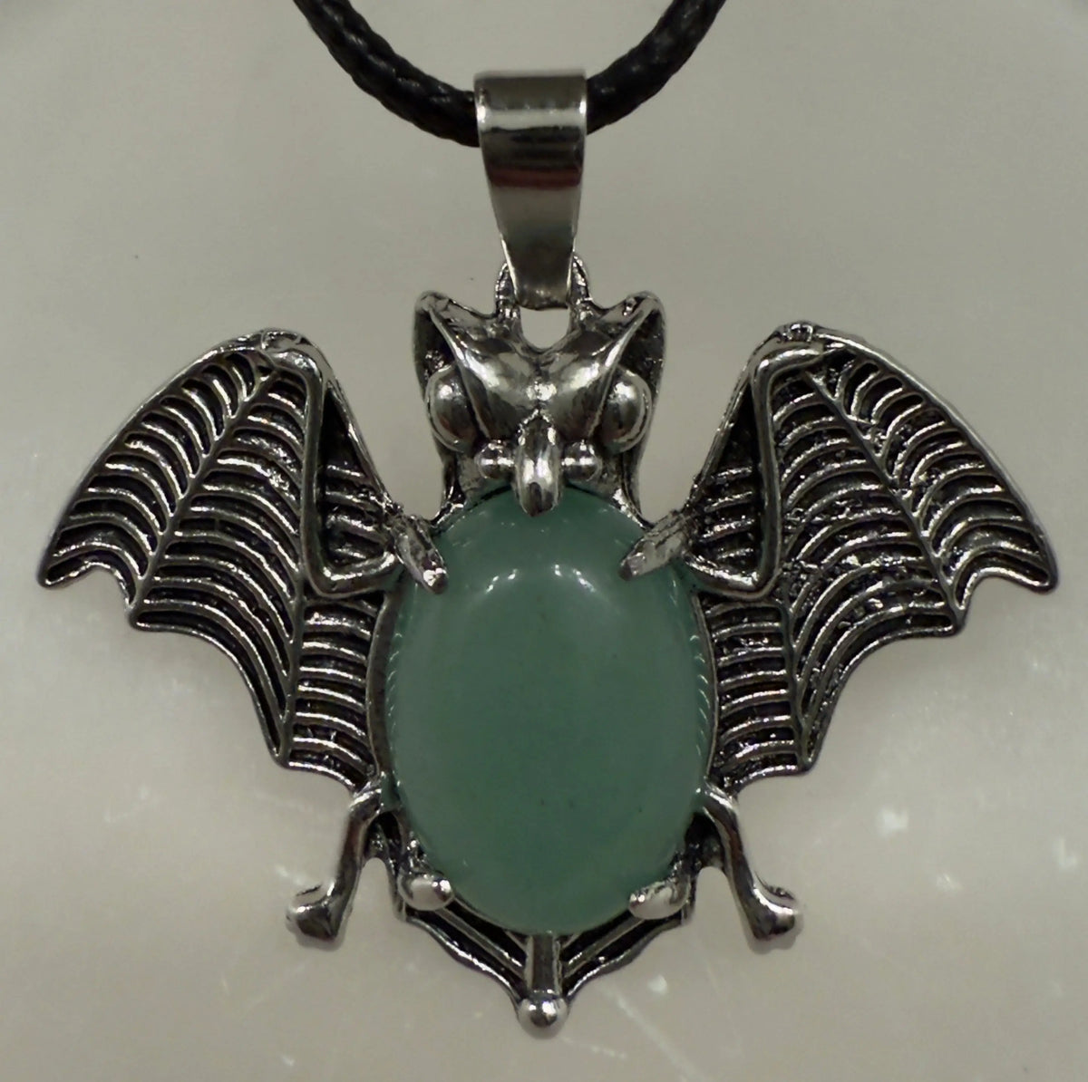 Bat pendant with natural crystal point full display