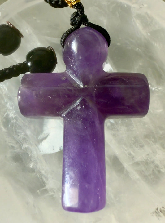 Amethyst cross pendant necklace on black braided cord