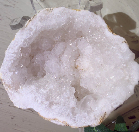 Open geode with white crystals.