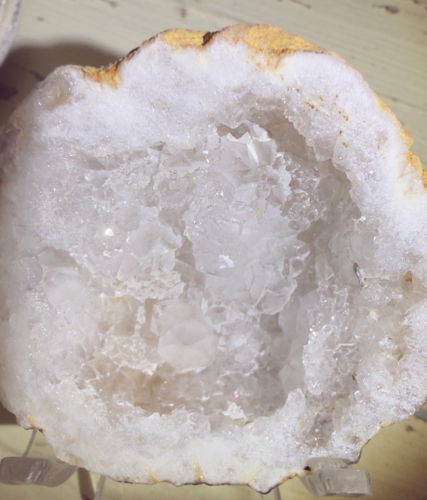 Translucent geode with white quartz crystals.