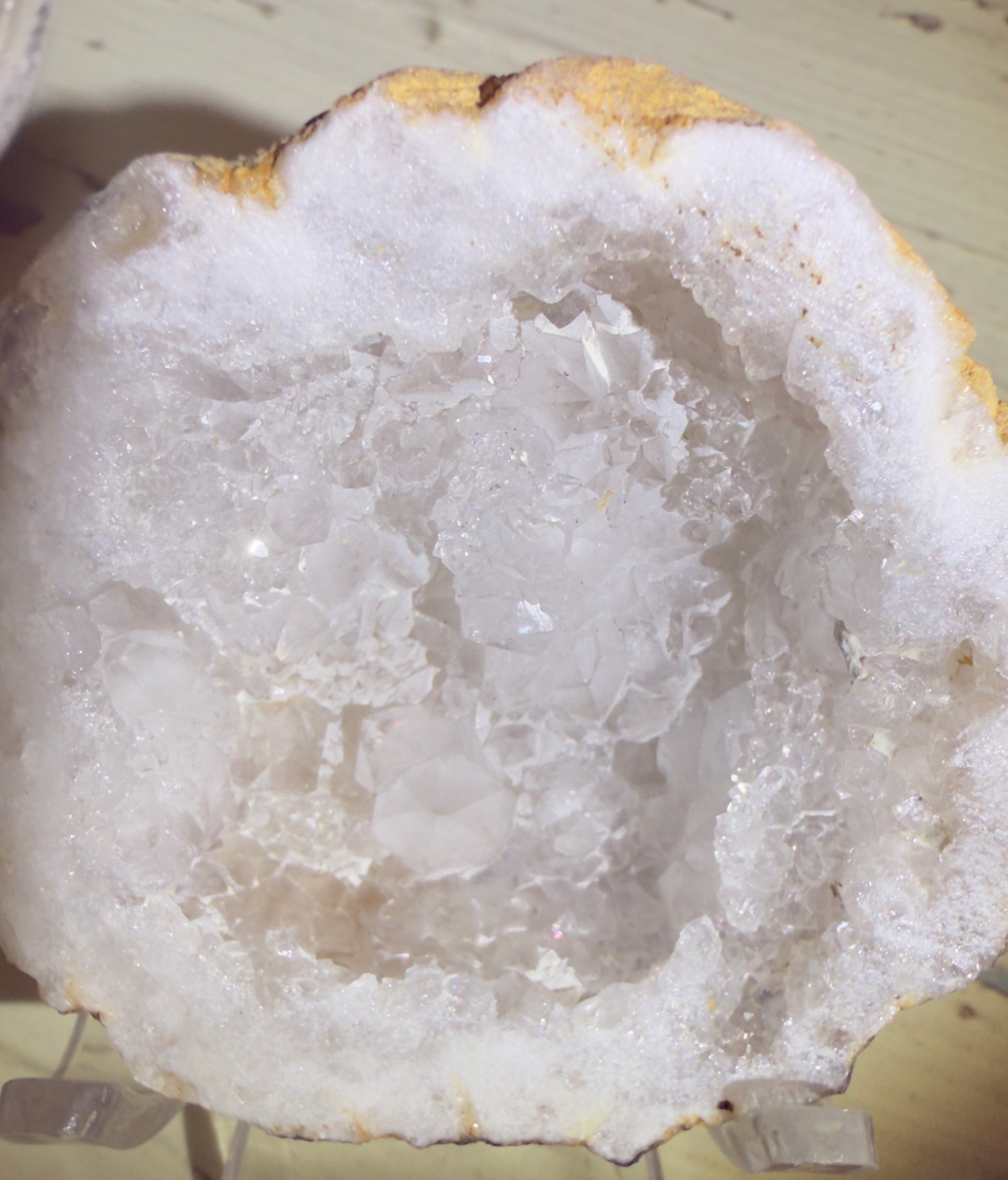 Translucent geode with white quartz crystals.