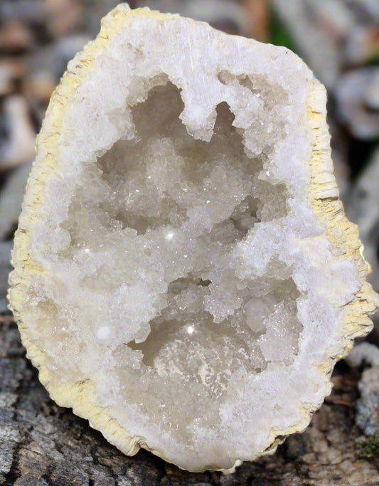 Close-up of a geode with sparkling crystals inside.