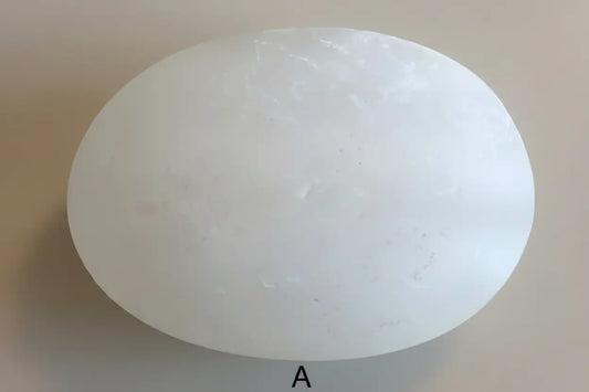 White Selenite oval palm stone for spiritual clarity