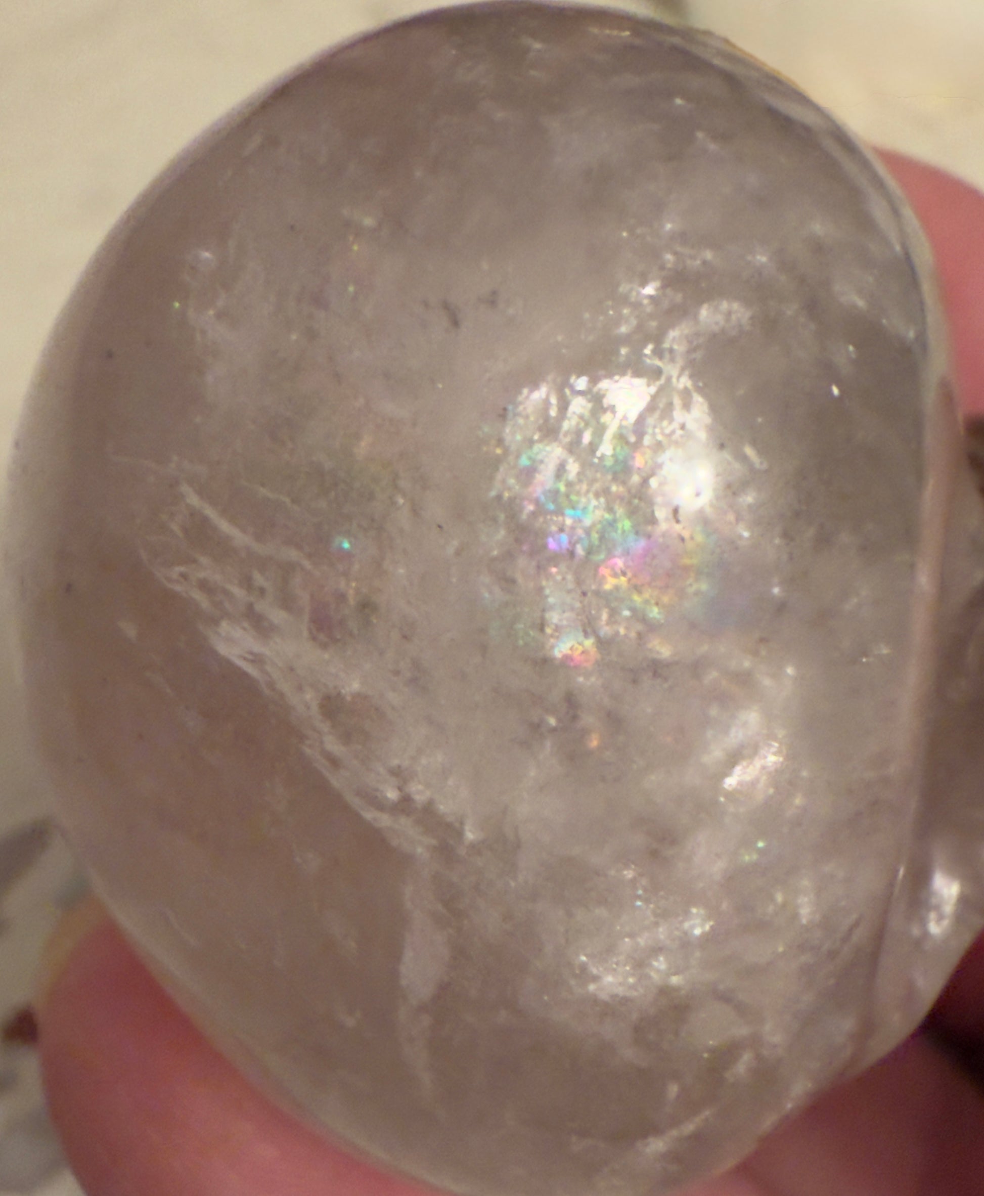Clear Quartz skull carving picture from overhead showing "rainbow" 