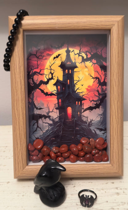 Framed Haunted House Art Work with Red Jasper Crystal inside the Frame. Crystal Set Black Obsidian Carved Raven Bat Ring with crystal center and Black Obsidian 8mm Bead Brac
let
