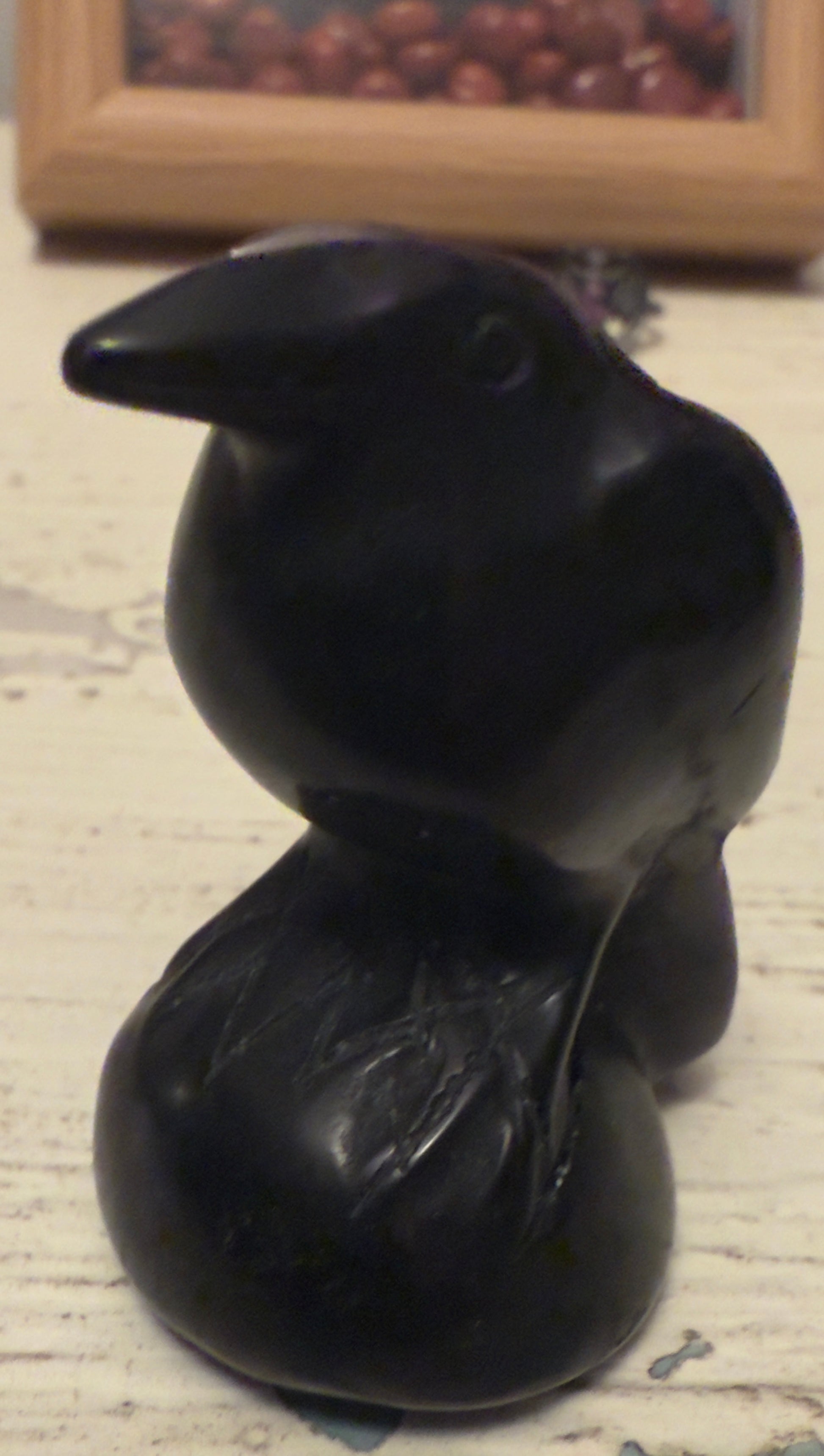 Black crow figurine.