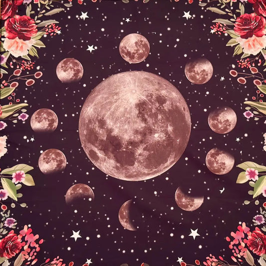 close up of moon phase altar cloth, background dark charcoal with flowers in all corners. red and pink flowers 