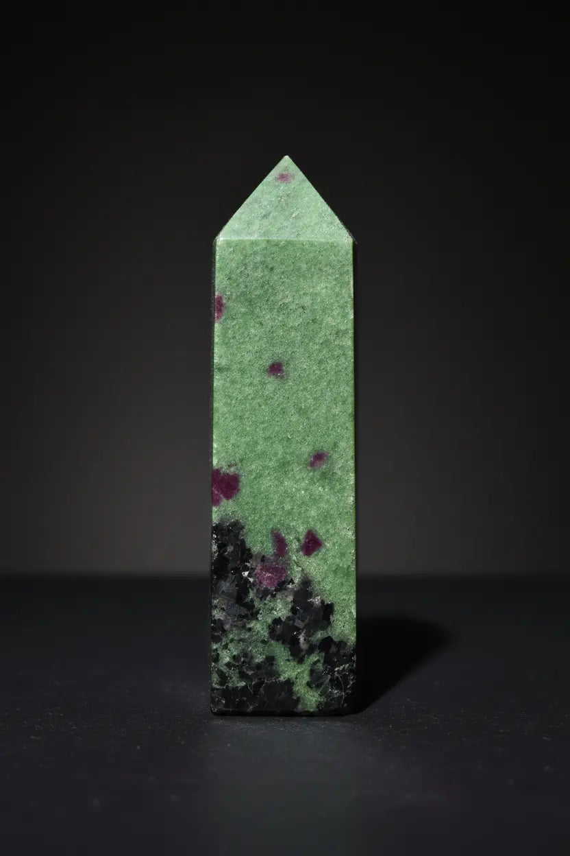 Angle 5 Ruby in Zoisite Tower Bright Green and sight purples with speckles of black 