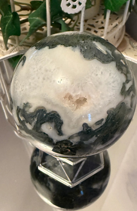 Moss Agate sphere with green and white patterns on stand