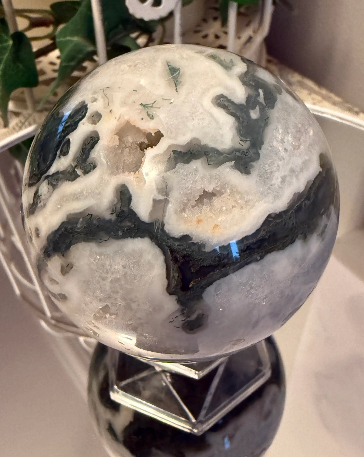 Moss Agate sphere with small druzy close-up