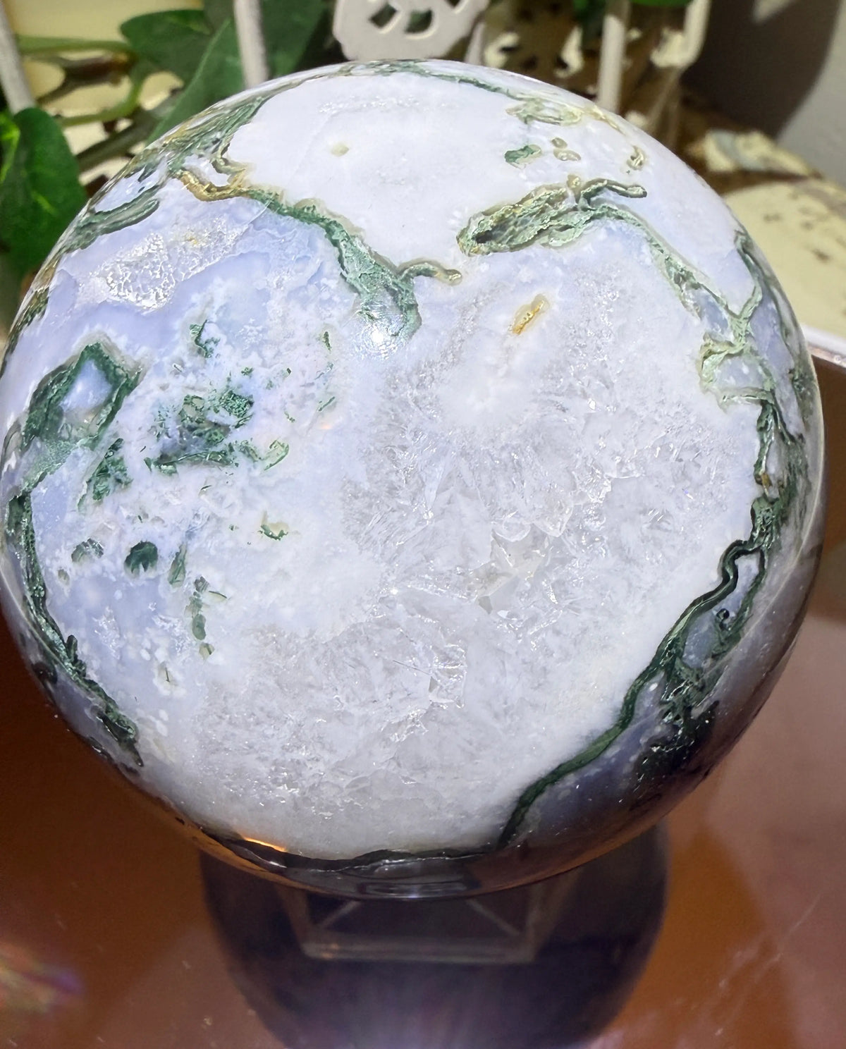 close up of tree agate crystal sphere