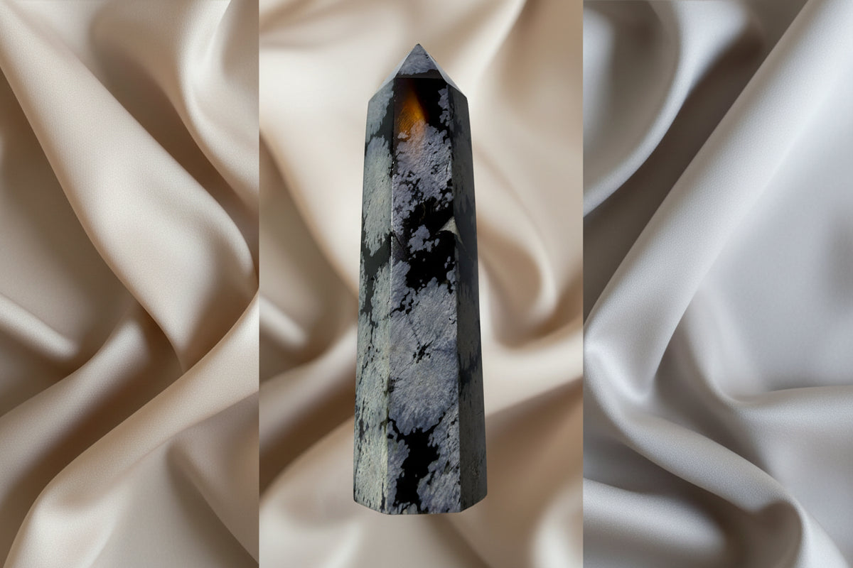 photo Snowflake Obsidian Hex Tower black and gray with a white background

