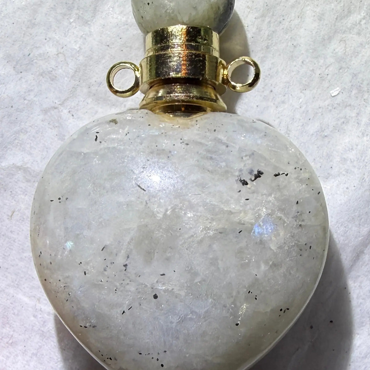 rainbow moonstone carved heart pendant wish bottle with blue flash 