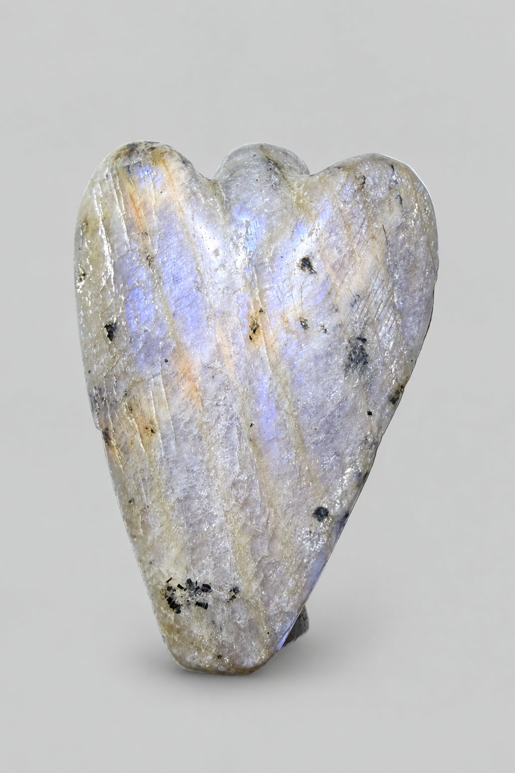 rainbow moonstone hand carved angel figurine.  Natural soft blue adularescence - back side of figurine
