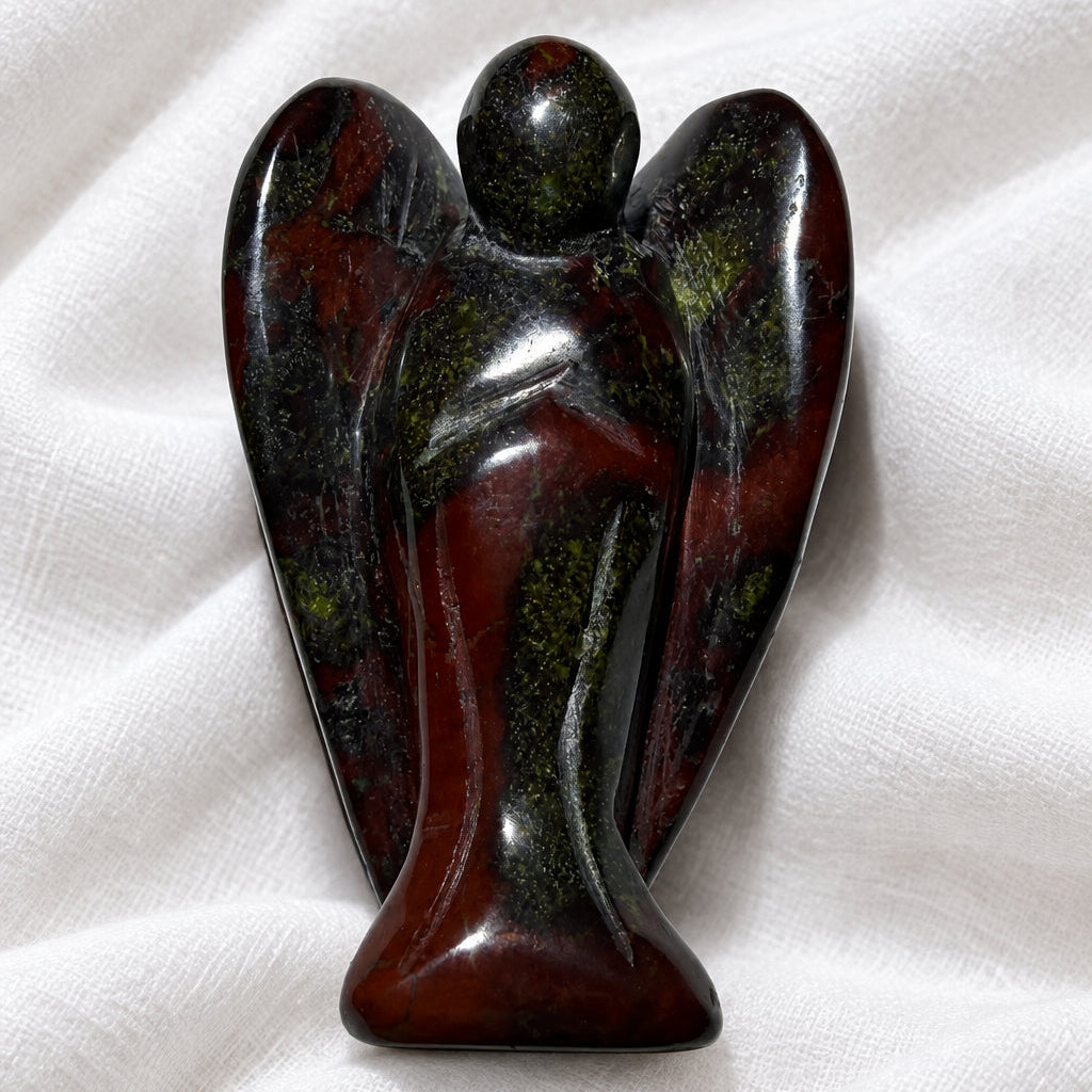 photo natural dragon’s blood hand carved angel. Deep rich browns and greens