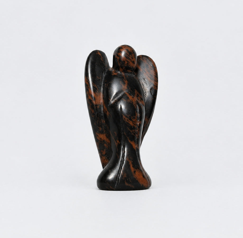 side view of hand carved angelic figurine - stone is mahogany obsidian