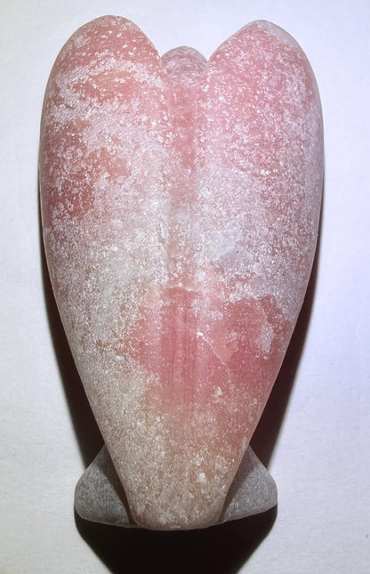 back side pink calcite carved angel showing wings