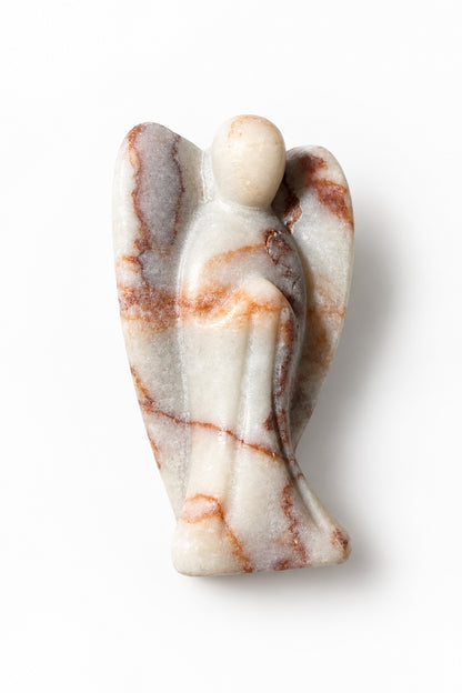 Red vein jasper hand carved angel resting on a white background