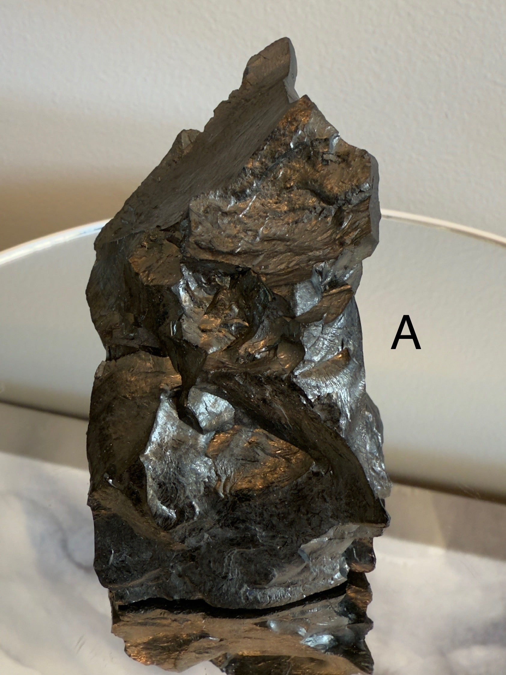 Natural shungite crystal healing stone for EMF protection, grounding, and energy balance