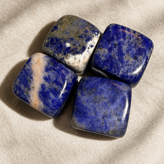 close up four sodalite crystal cubes 