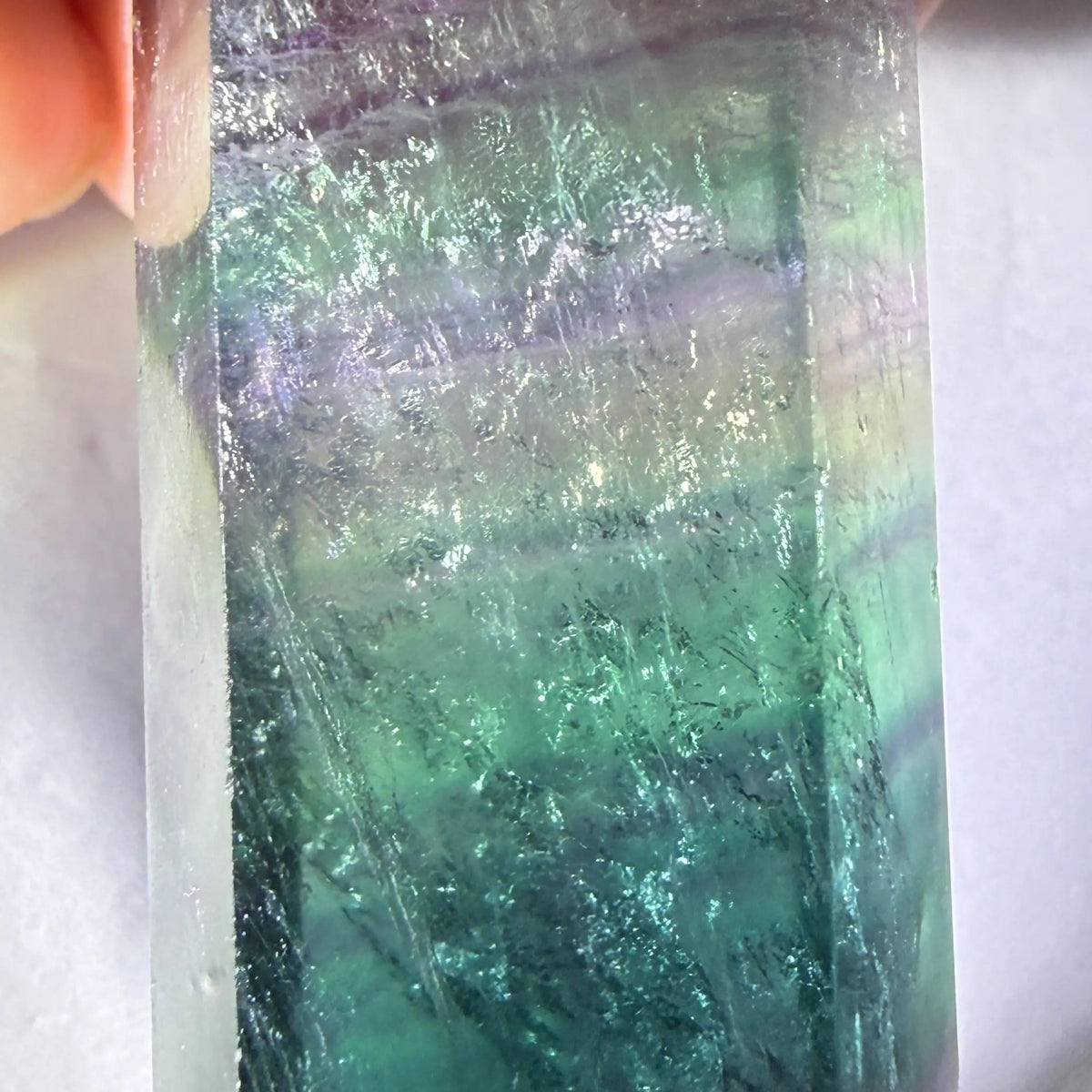 super close-up rainbow fluorite double point 