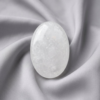 Milky Quartz palm stone close up photo