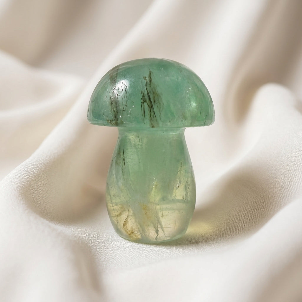 close up green fluorite carved mushroom bright green with natural inclusions