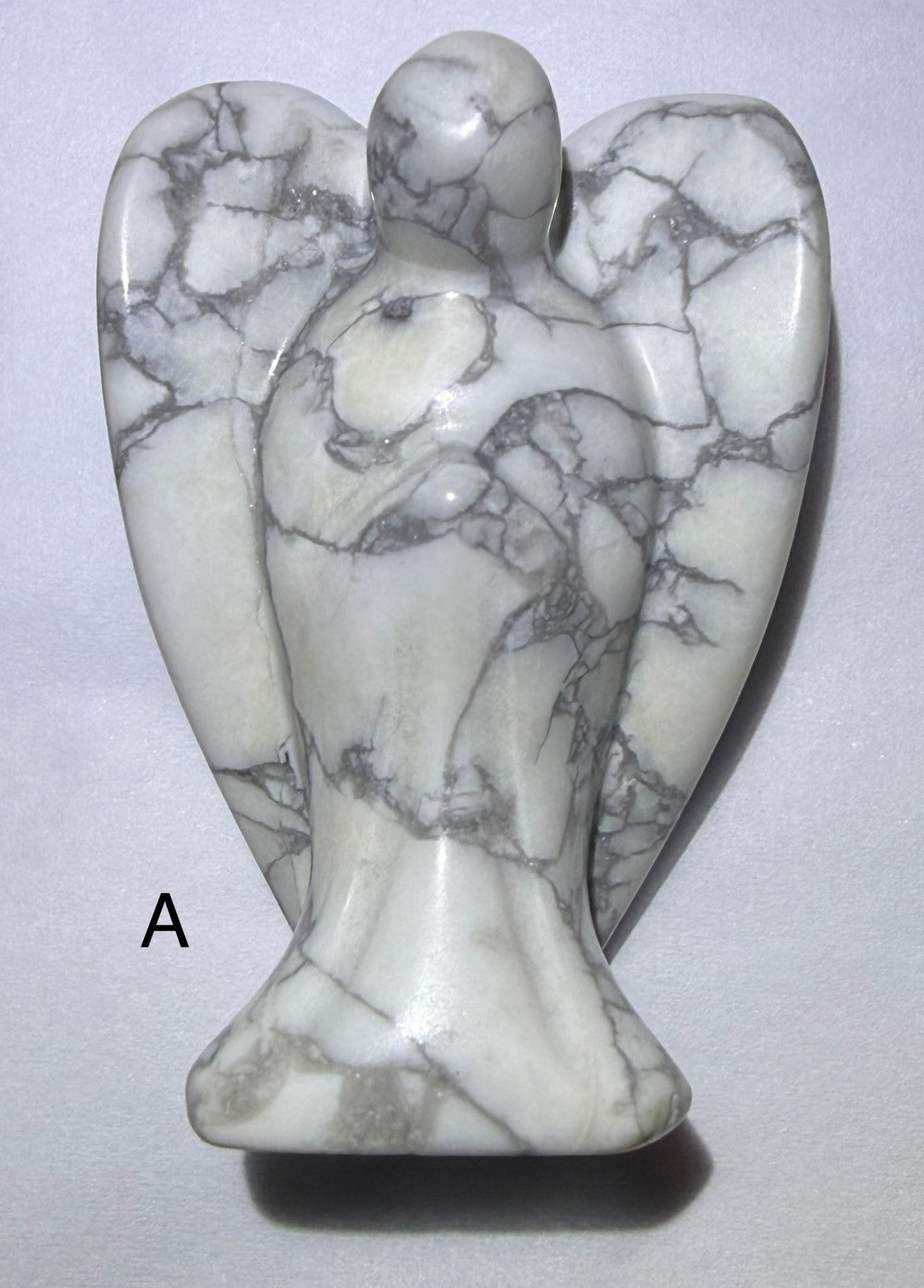 hand carved angel made from howlite 