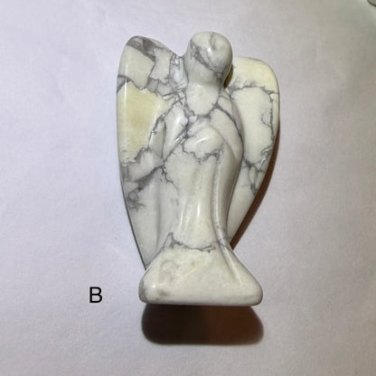 side view photo of hand carved angel made from howlite angel b