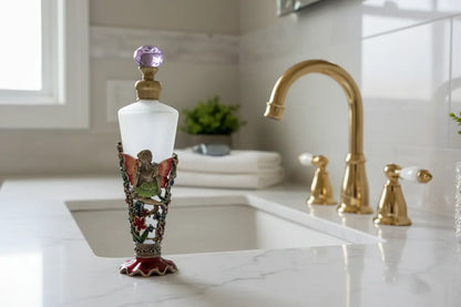 Rose Fairy frosted glass perfume bottle on vanity counter