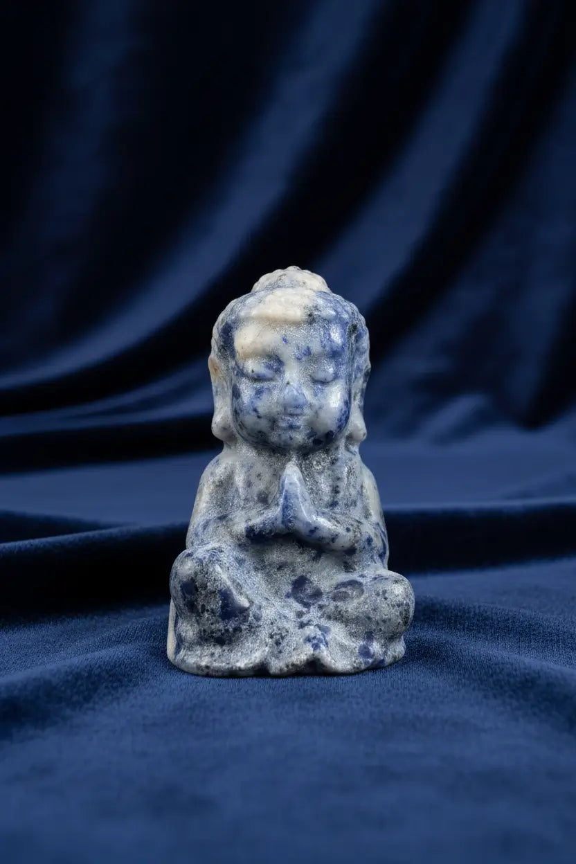 sodalite carving praying buddha figure