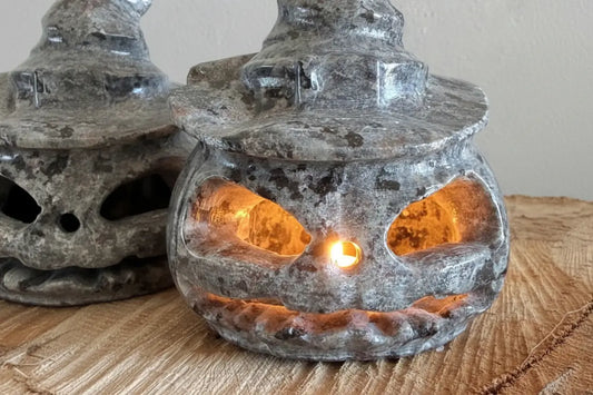 Yooperlite Jack O Lantern crystal carving on wood slab