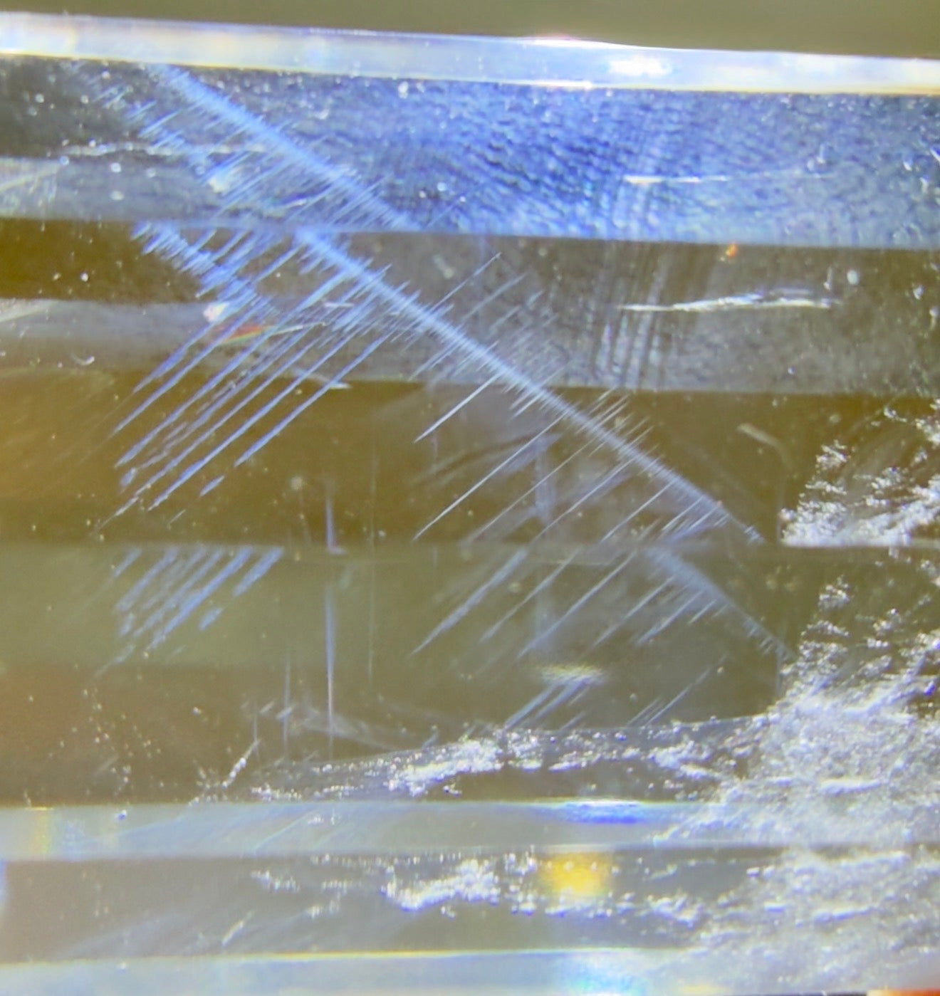 Close up of clear quartz double point showing the blue tyndall inclusion in this piece